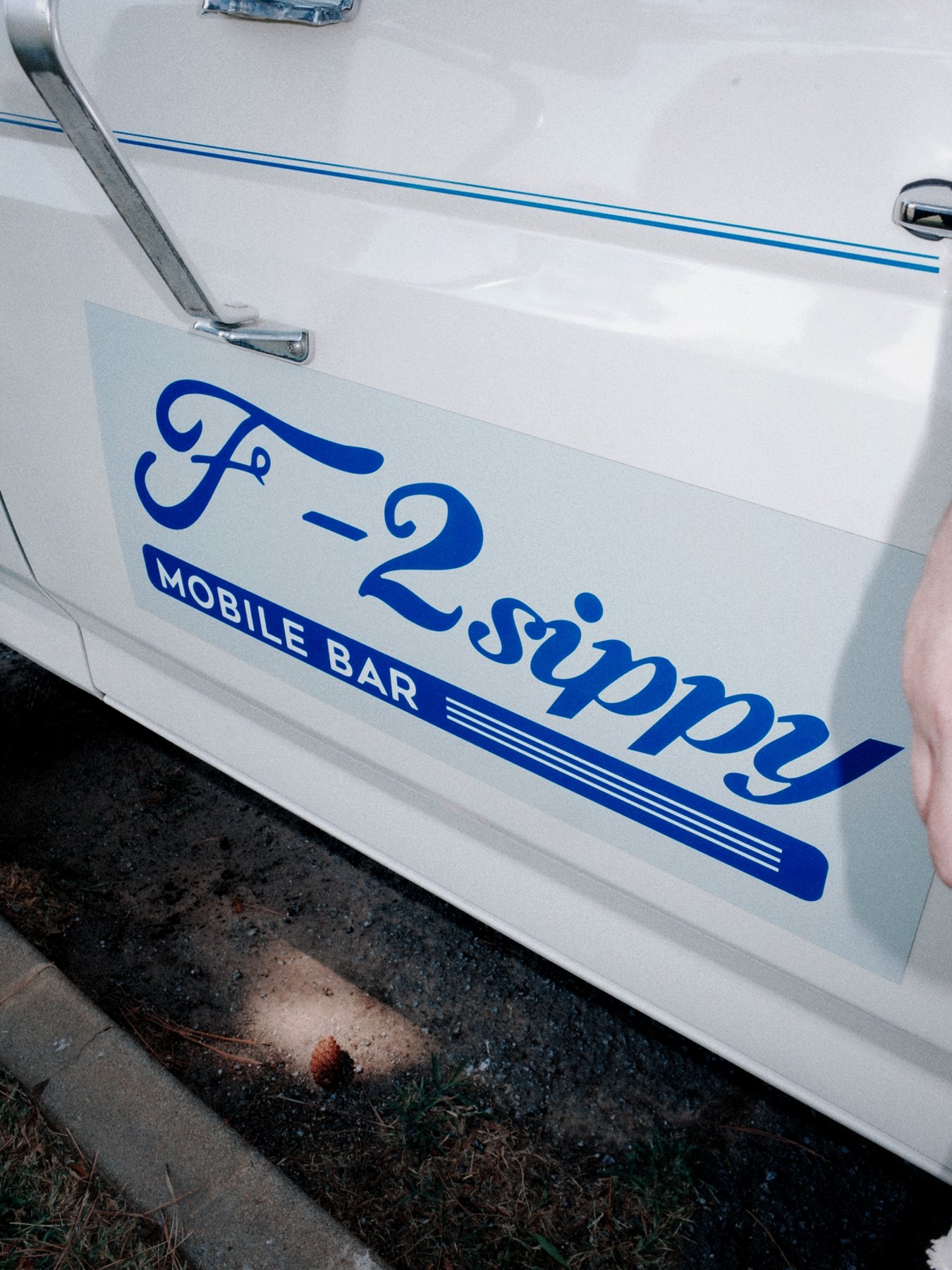 F-2 Sippy logo painted on the side of the vintage truck