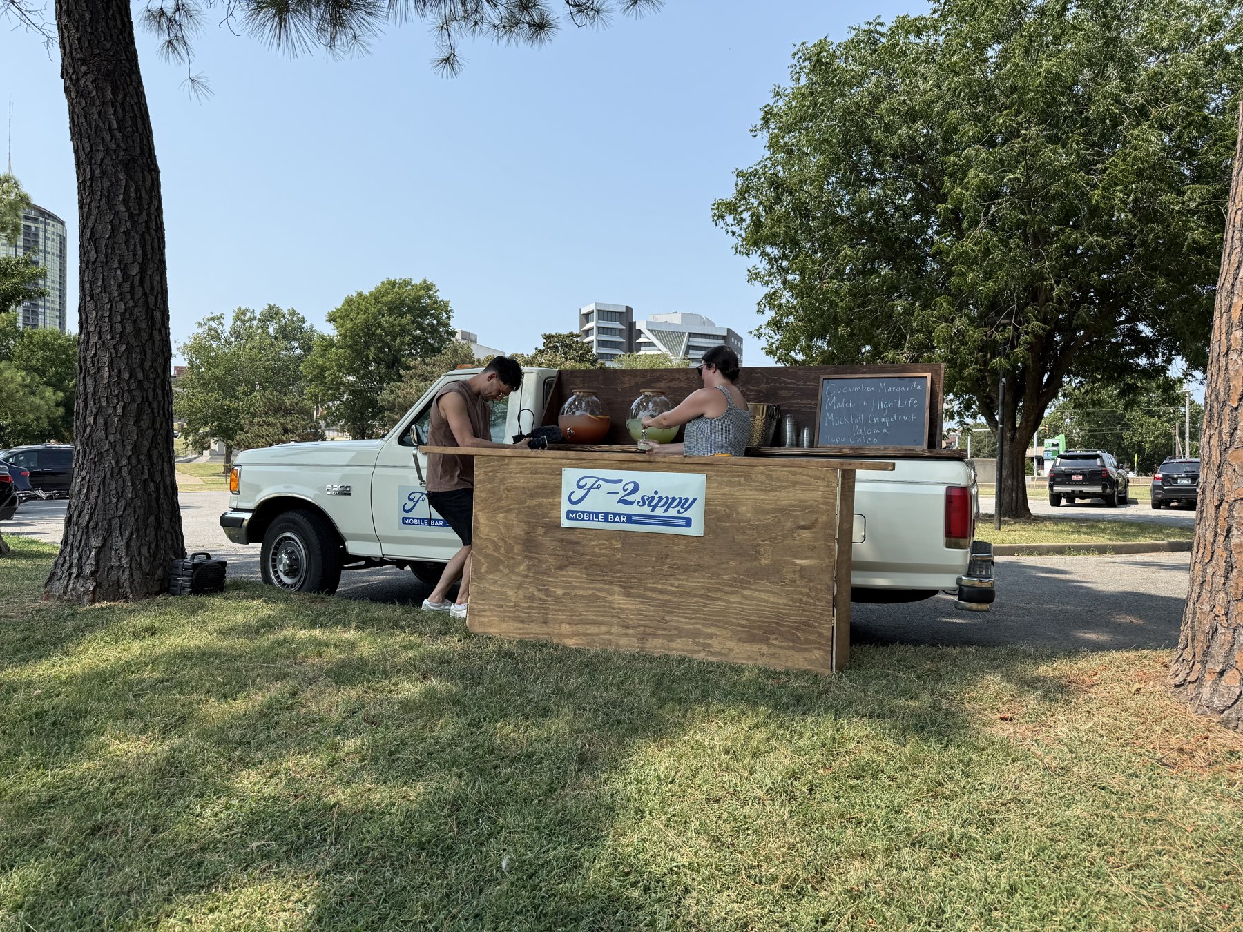 F-2 Sippy truck set up under the trees at launch party